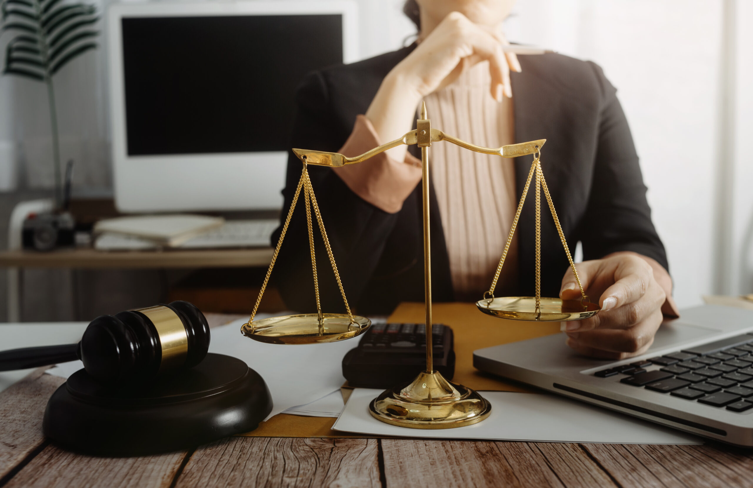 justice and law concept.Male judge in a courtroom on wooden tabl